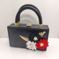 flower top handle trendy bag. 