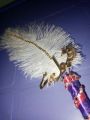 nikha pen white feather. 