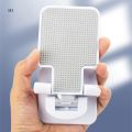 Desktop mobile Holder stand for phone adjustable foldable mobile phone stand. 