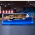 Hot sell trending blue water-filled desk toy liquid wave paperweight. 