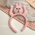 Fun raising hands, pulling hair, pink rabbit headband, funny headband, grabbing bangs, tying hair, cartoon headband. 