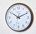 Champion wall clock 13 inches. Brown wall clock.Ticking motion clock.Original Toshiba battery included 🔋. 