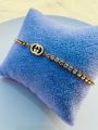 Gucci Adjustable Bracelet with zirconium stone premium quality gold colour. 
