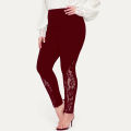 Plus size  Women's oversized leggings with lace patchwork and contrasting hollow out design, slim fit and slimming pants. 