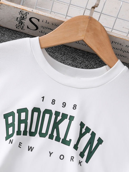 Spring/Summer%20Children's%20Fashion%20Trend%20Girls%20Athleisure%20Basic%20Three-Piece%20Letter%20Print%20T-Shirt%20Solid%20Color%20Halter%20Vest%20Sweatpant%20-%20Image%203