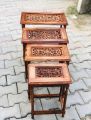 Wooden crafted Nested 4 table set. 