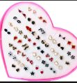 Pack of 36 pair of earrings multi Color.Beautiful Small studs Baby girl ear rings Unique style ear rings. 