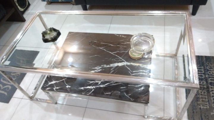 Centre%20Tabel%20Stainless%20Steel%20Upper%20Top:%208mm%20Glass%20Top%20With%20Beveled%20corners.%20Lower%20Top:%20Marbel%20Top%20with%20Diamond%20Shape%20corners.%20Measurements:%20Length%2048%20inches%20Width%2024%20inches%20Height%2018%20inches%20-%20Image%205