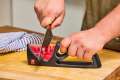 Multifunctional Kitchen 3 Segment High Quality Knife Sharpener Stainless Steel Household Hand Held Machine Effortlessly Enhance Blades Sharpness, Ensuring Optimal Cutting Performance And Durability. 