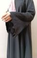 black colour imported nida fabric latest abaya with premium quality nug work on sleeves and front. 