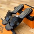 HERMES ORAN FLAT SANDALS. 