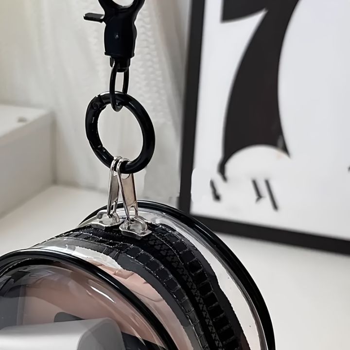 Portable%20Mini%20Clear%20Zipper%20Storage%20Bag%20-%20Space-Saving%20Organizer%20for%20Earphones%20&%20Chargers,%20Versatile%20with%20Handy%20Keychain%20Loop%20-%20Image%205
