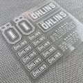 Ohlins Suspension Shocker Damper Motorcycle Decals - Transparent Adhesive Stickers with Warning Labels for Enhanced Performance.