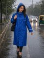 StormFit Women’s Long Waterproof Raincoat with Hood.