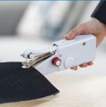 (F). JML Magic Stitch Portable Cordless Handheld Sewing Machine. 