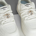 A Pair of Detachable Cute Little Bee-Style White-Winged Shoes with Glittery Decorations on the Laces and the Buckle.. 