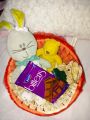 cute gift baskets with one stuff toy and chocolates. 