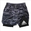 2-in-1 running shorts, suitable for men's fitness leggings, with phone pocket and simple letter print for summer sports pants.