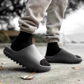 Men's slippers, home sandals, couples, household thick soles, anti slip, wear-resistant soft sandals, indoor coconut yzy slide.