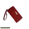 woman lining clutch. 