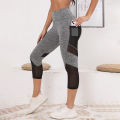 Mesh High Waist Yoga Pants Capri Leggings with Pockets for Women Tummy Control Workout Capri Leggings for Women.