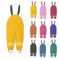 Children's Novelty Solid Color Pocket Fashion Raincoat Fashion Boy and Girl Adjustable Strap Beach Long Romper. 