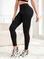 Women's high-waisted solid color pocket yoga leggings, slim-fit stretch leggings, comfortable and breathable fitness pants.
