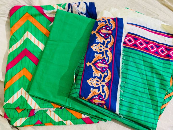 3pcs green printed Alkram unstitch lawn suit Daraz.pk