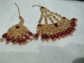 bridal first day jewellery heavy set in golden and red colour unique and stylish design. 