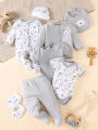 his 8-piece unisex newborn layette set fits boys and girls aged 0-9 months, with lovely grey bear prints..