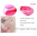 Portable mini UV light nail dryer. 