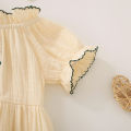 Summer female infant apricot sun print short-sleeved triangle Romper and bow headgear two-piece set. 