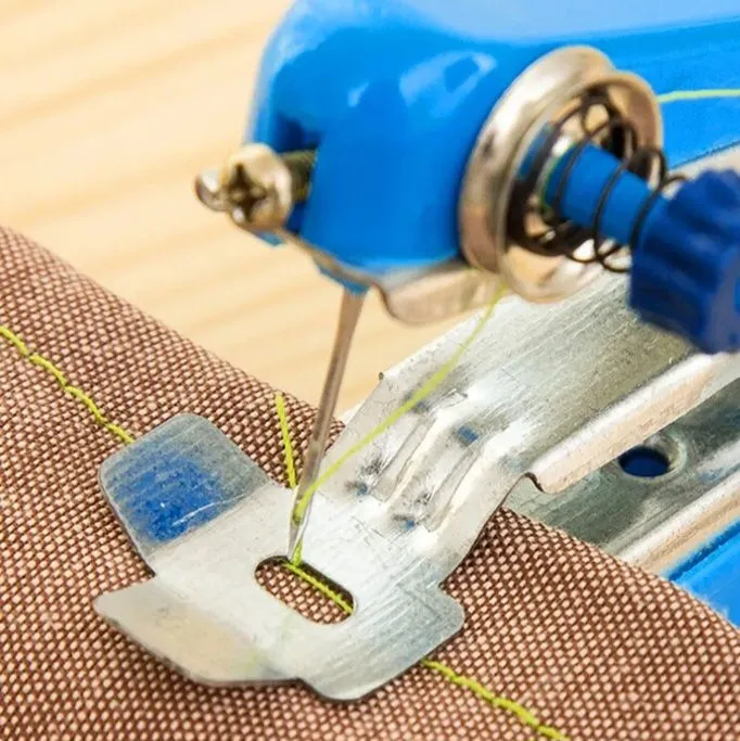 imported%20Portable%20Needlework%20Cordless%20Mini%20Hand-Held%20Clothes%20Fabrics%20Sewing%20Machine%20ravel%20Small%20Embroidery%20Manual%20Operation%20AttockSharif%20-%20Image%202