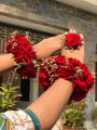 artificial flower jewellery set it include ( mala, gajra,ring , hair bun ). 