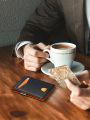 Minimalist men's RFID blocking multi-functional ultra-thin 12-card wallet, front pocket bi-fold solid color portable card holder. 