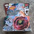Beyblade Beyblade with shock and 4D pull strap on front cover. 
