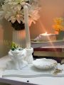 Set of 4 pc home decor set, one arch wavy tray, one shell tray, one candle holder, one lady head vase for flowers. 