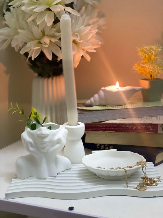 Set of 4 pc home decor set, one arch wavy tray, one shell tray, one candle holder, one lady head vase for flowers