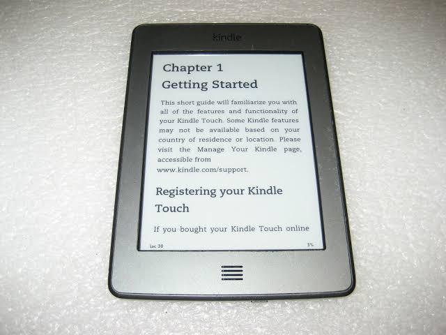 Amazon kindle 4th generation touch and audio 4gb 6 inches screen with spot on screen