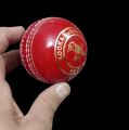 Original KookaBurra Red Hard Ball for Cricket. 