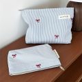 Light Blue Striped Bow Cosmetic Bag, Women Travel Makeup Organizer with Zipper, Multi-Use Toiletry Pouch. 