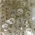 2-hole 100-piece transparent buttons pack. 