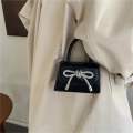 Mini trending bow bag. 