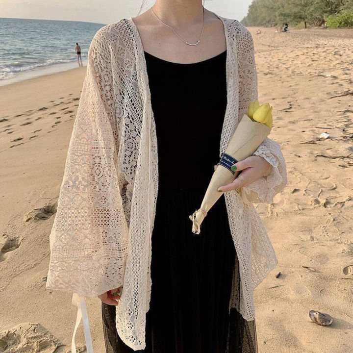 Swanwany Summer sweet thin sunscreen cardigan female Korean lace up openwork blouse female holiday beach daily long sleeve blouse phone case