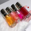 Purple Plumping Lip Gloss Oil Long-lasting Moisturizing Liquid Lipsticks with Chubby Lips Brush. 