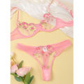 Standard quality flower transparent bra panty set.