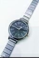 Curren 9081 Stainless Steel Analog Watch For Women. 