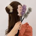 1 pcs messy hair bun flower design.