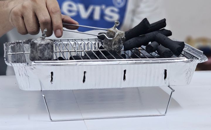 Portable%20BBQ%20Set%20AKA%20Instant%20Barbecue%20Set%20-%20Comes%20with%20500gm%20premium%20charcoal,%20BBQ%20Net,%20stand%20&%20Tong%20&%202%20Free%20Fire%20Starter%20-%20Image%207