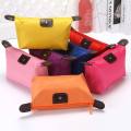 Portable Small Cosmetic Case with Zipper Makeup Organizer Waterproof Nylon Toiletry Pouch Mini Cosmetic Bags for Beauty Travel.